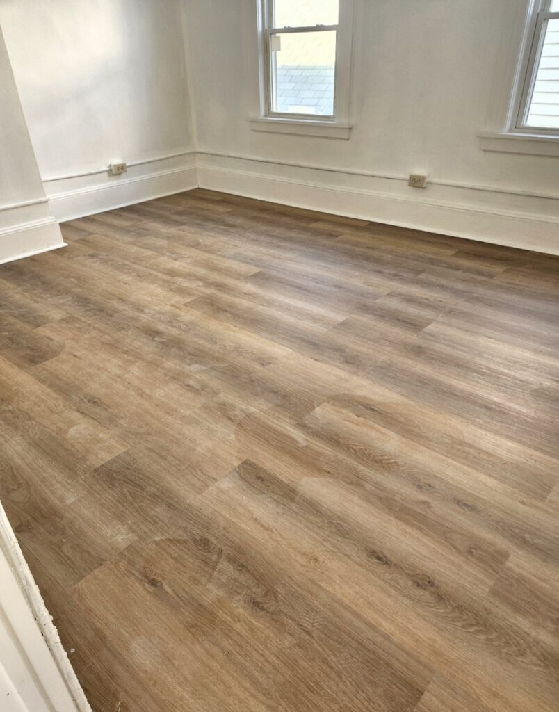 Finished hardwood flooring installed by Pillco Construction Corp