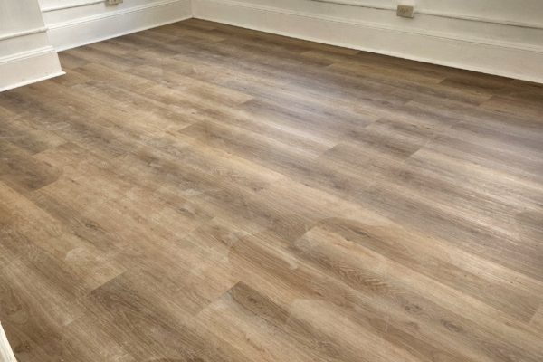 Finished hardwood flooring installed by Pillco Construction Corp