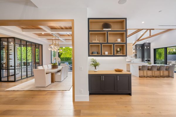 a-living-room-and-dining-area-with-an-island-in-th-2025-02-10-06-19-33-utc-scaled.jpg